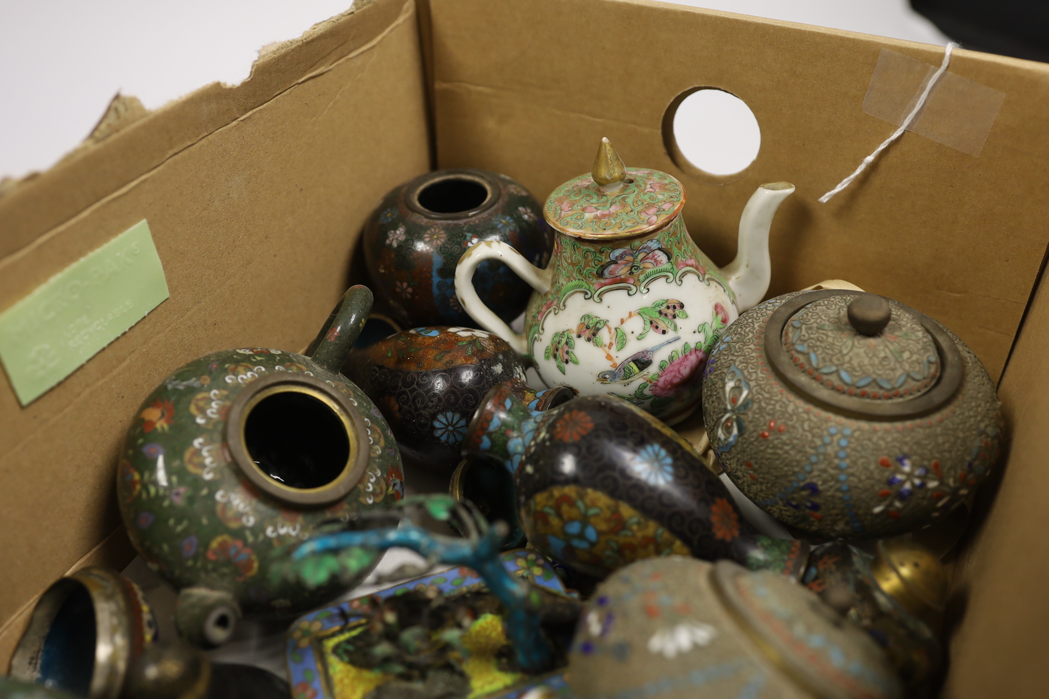 Two miniature Cantonese porcelain teapots, and a small collection of Chinese and Japanese cloisonné and champlevé enamel wares (12)